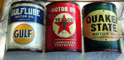 Vintage old gas station Texaco, Gulflube, Quaker State motor oil cans